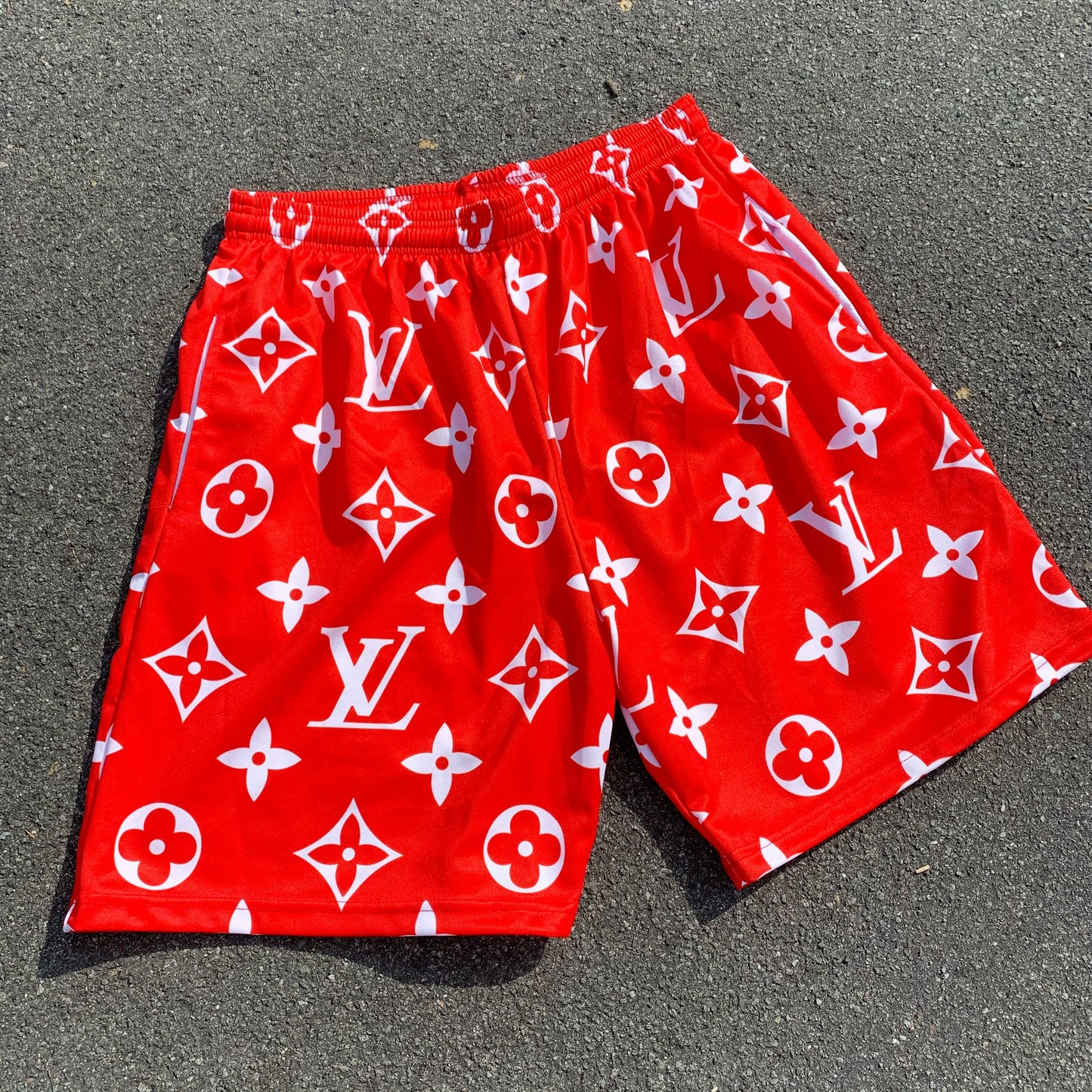 Red monogram shorts